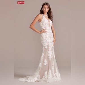 *NEVER WORN* absolutely beautiful wedding dress.